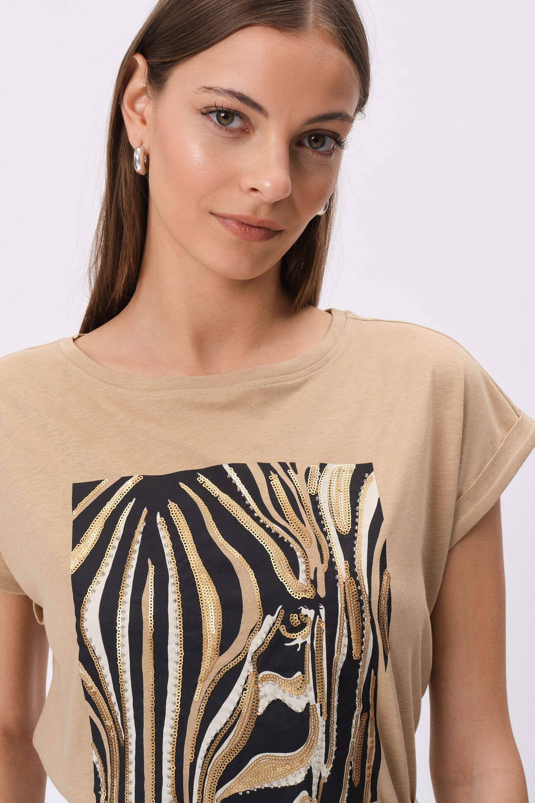 Jasnobeżowy top z grafiką animal