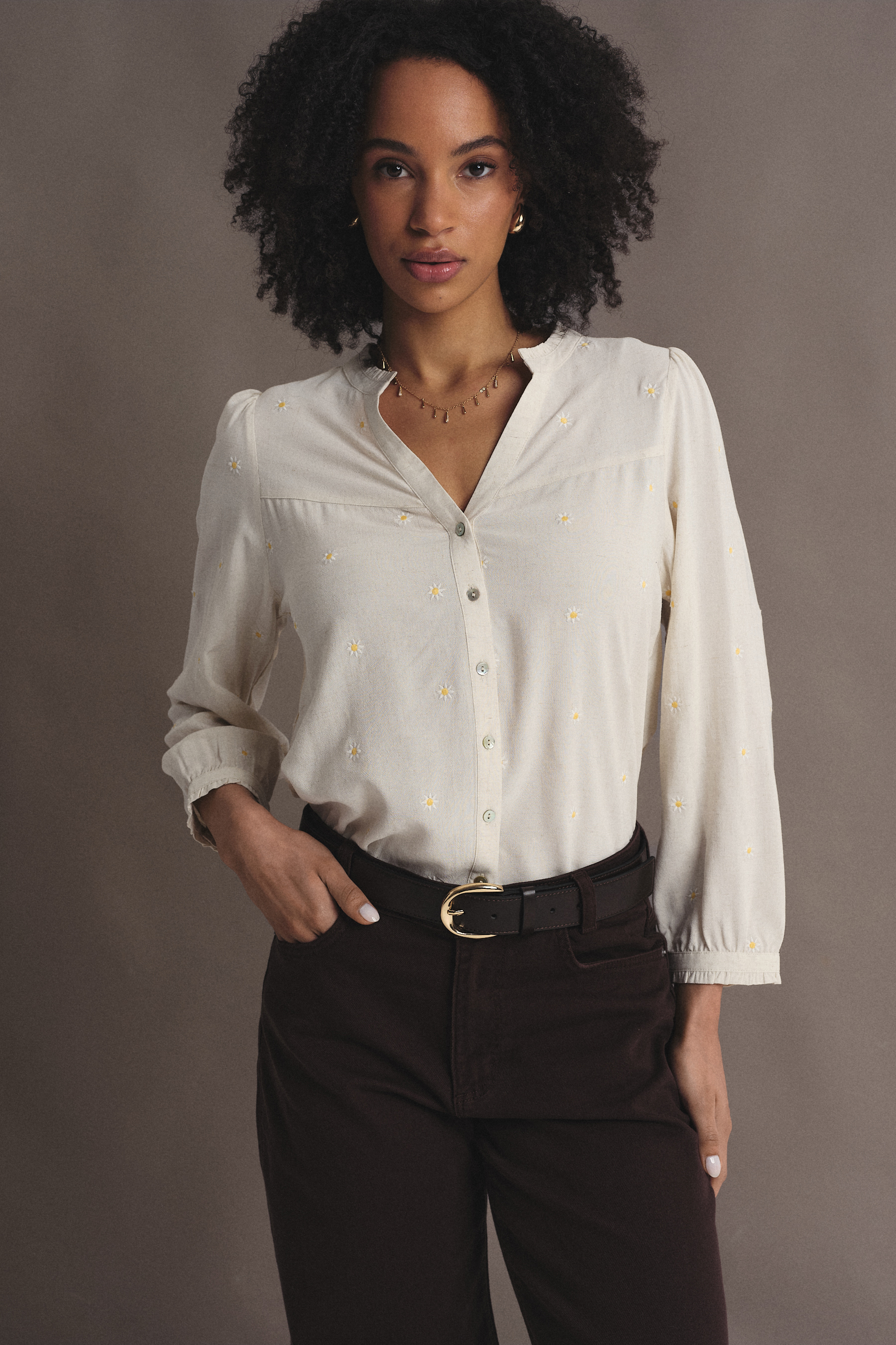 Subtelna kremowa bluzka z riuszką