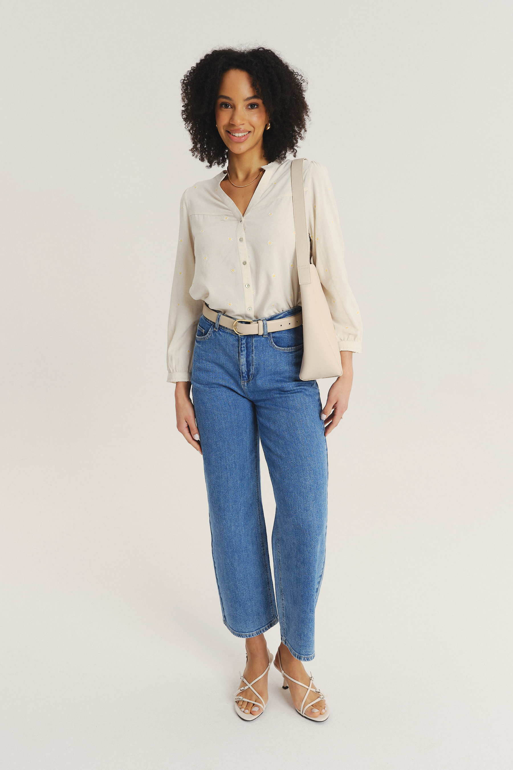 Subtelna kremowa bluzka z riuszką