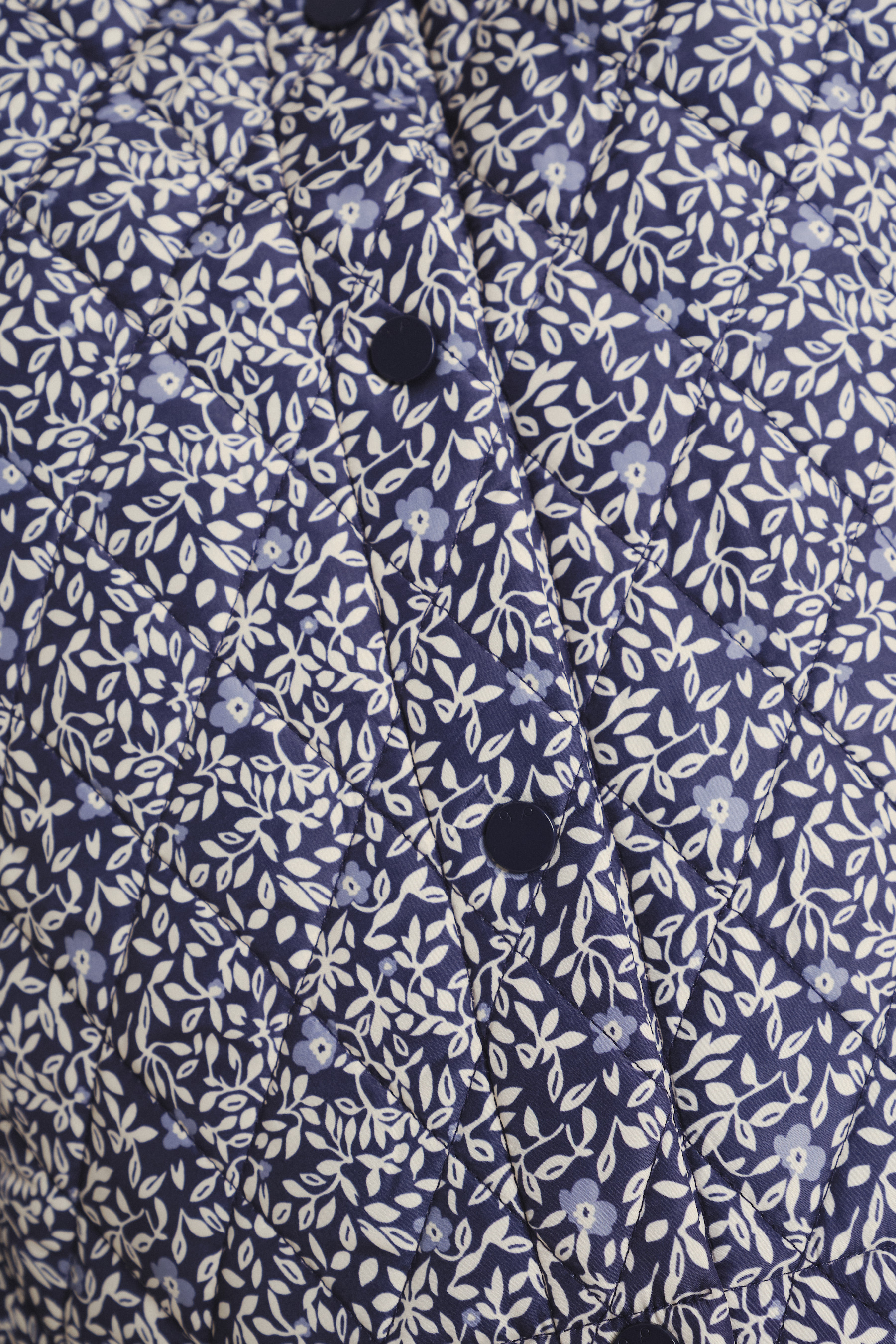 Stylowa kamizelka w drobne kwiaty