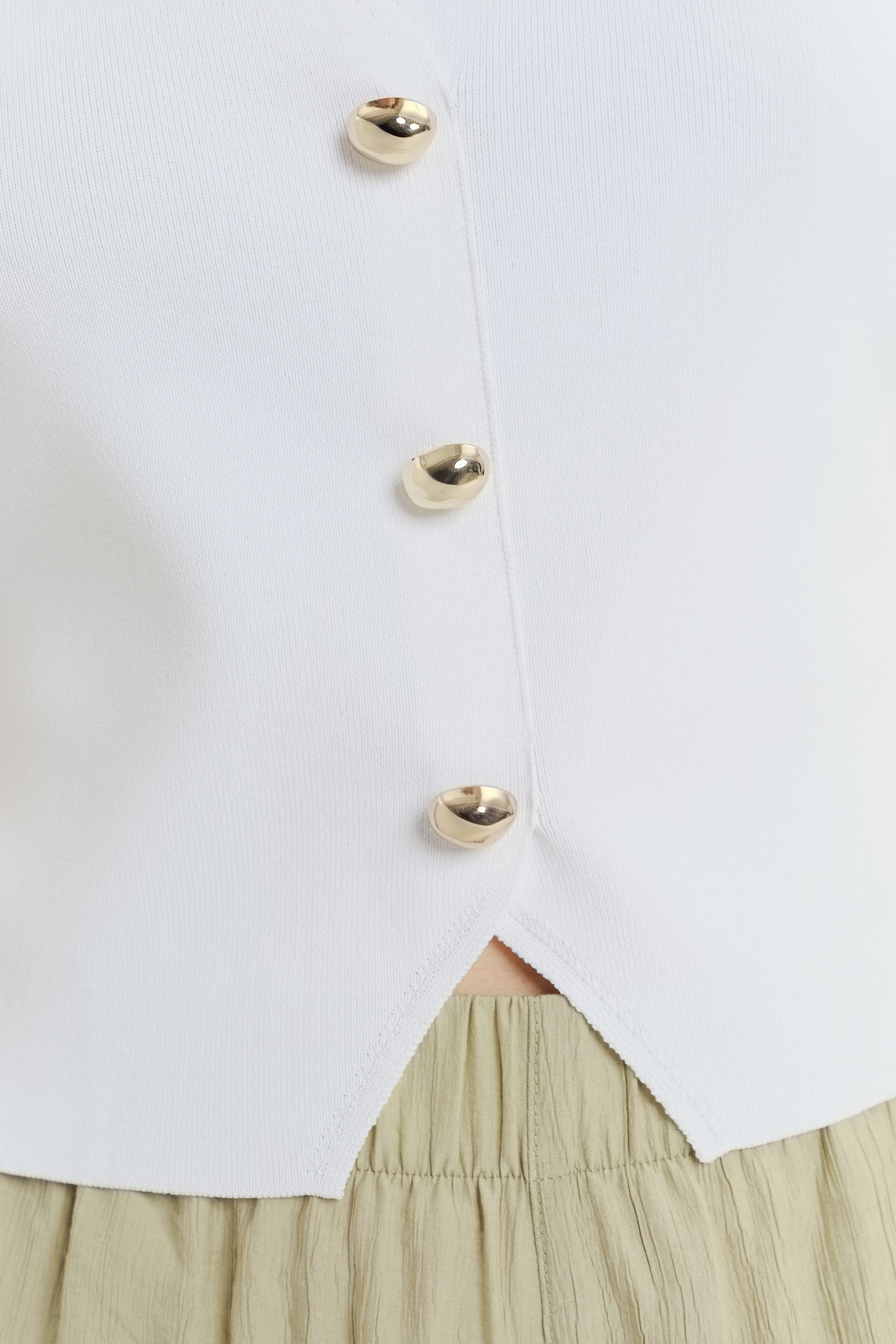 Biała kamizelka dzianinowa 