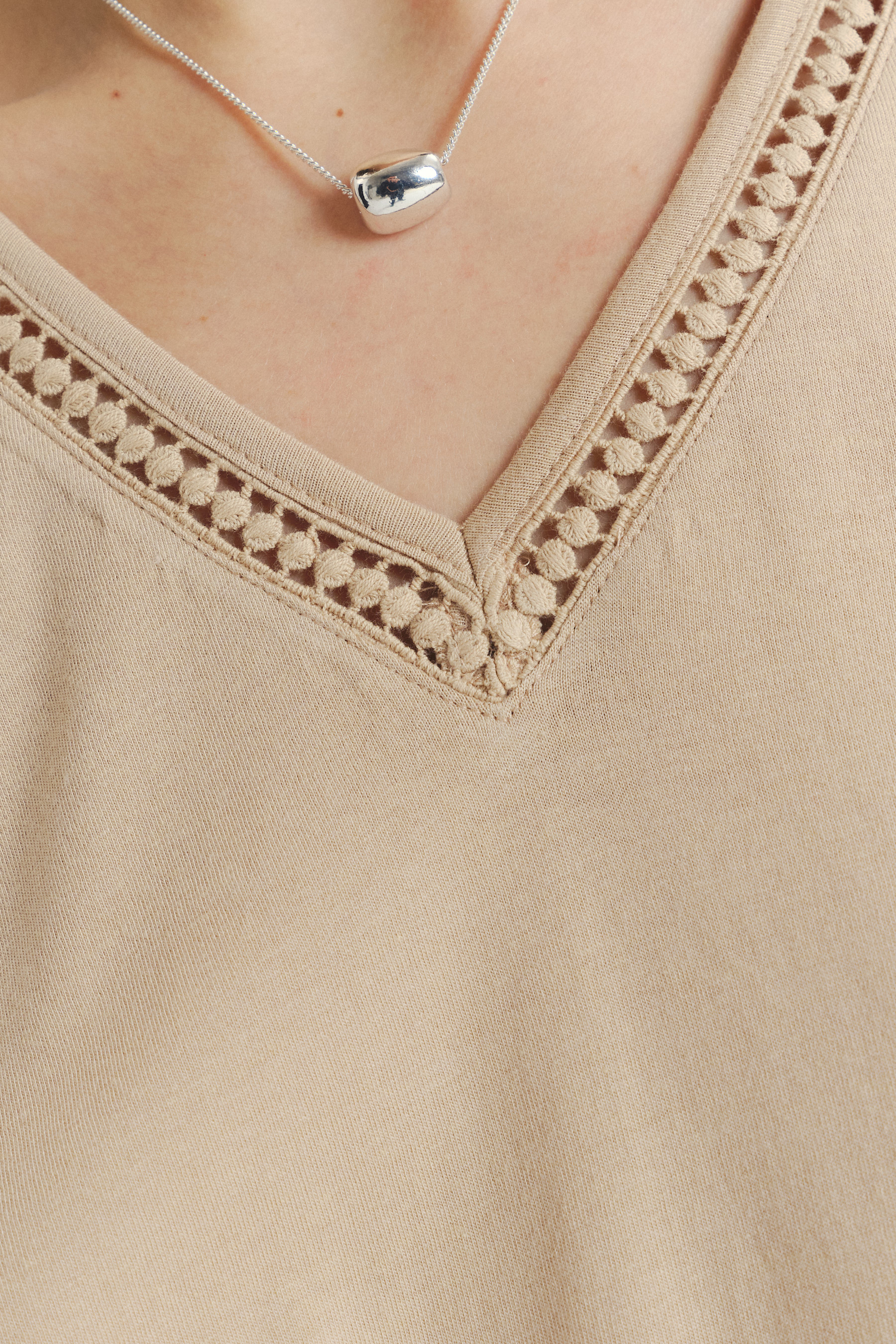 Uniwersalny beżowy top