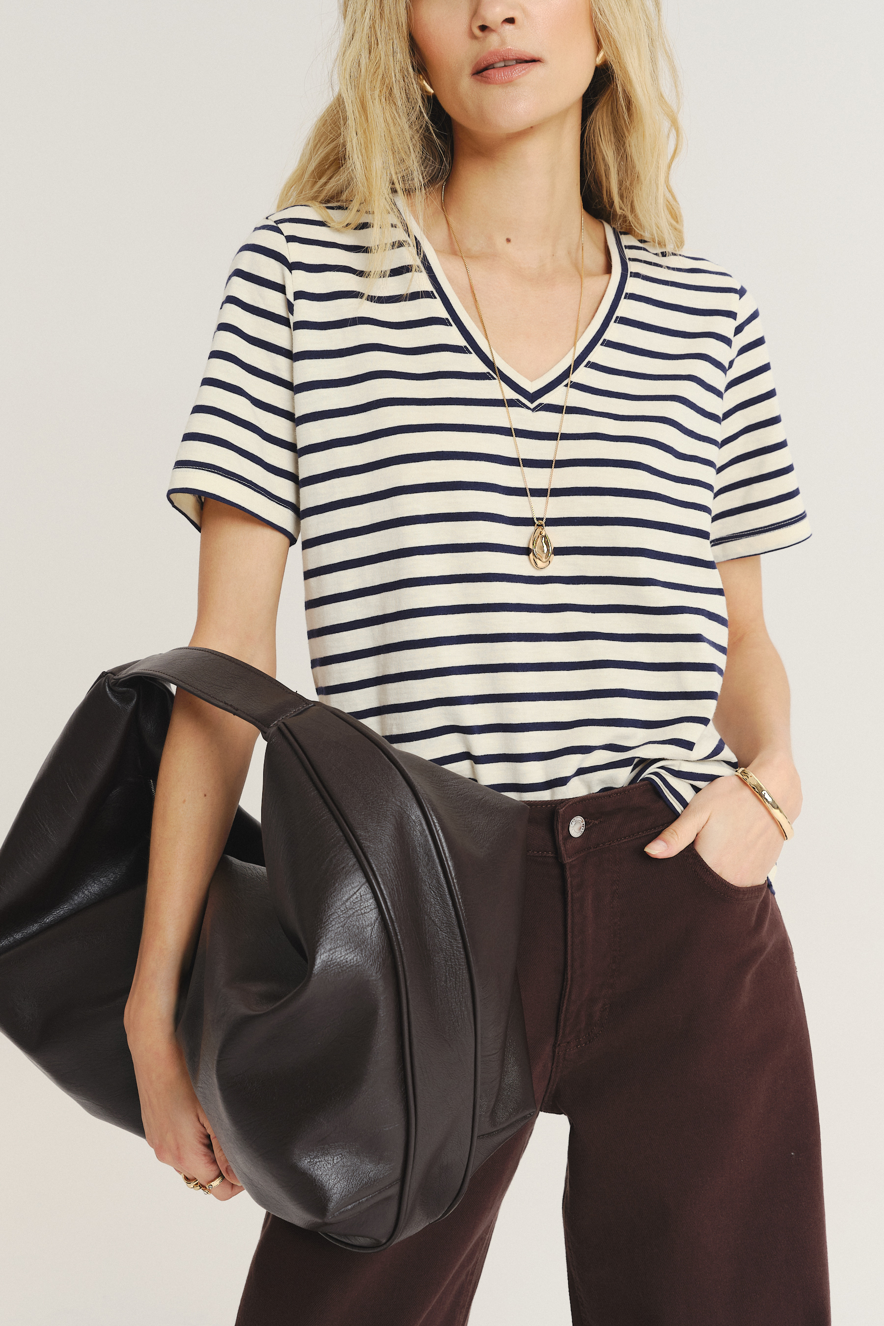 Luźny top w kontrastowe paski