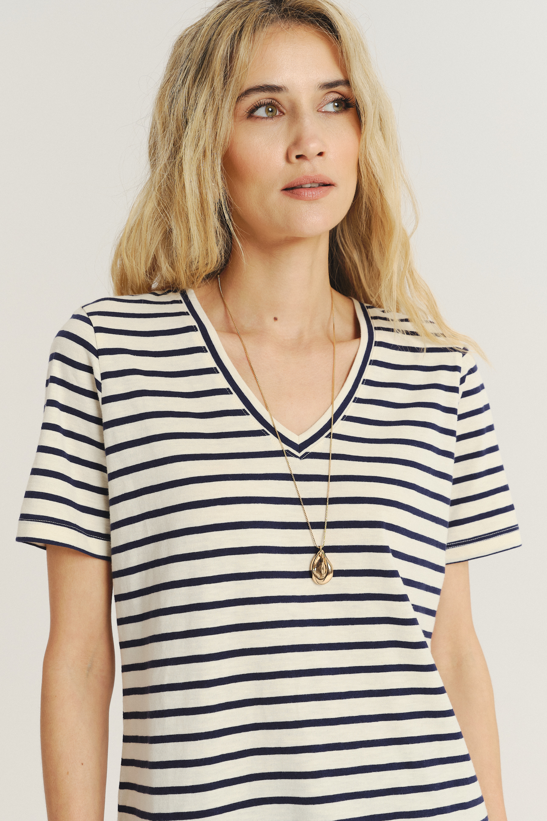 Luźny top w kontrastowe paski