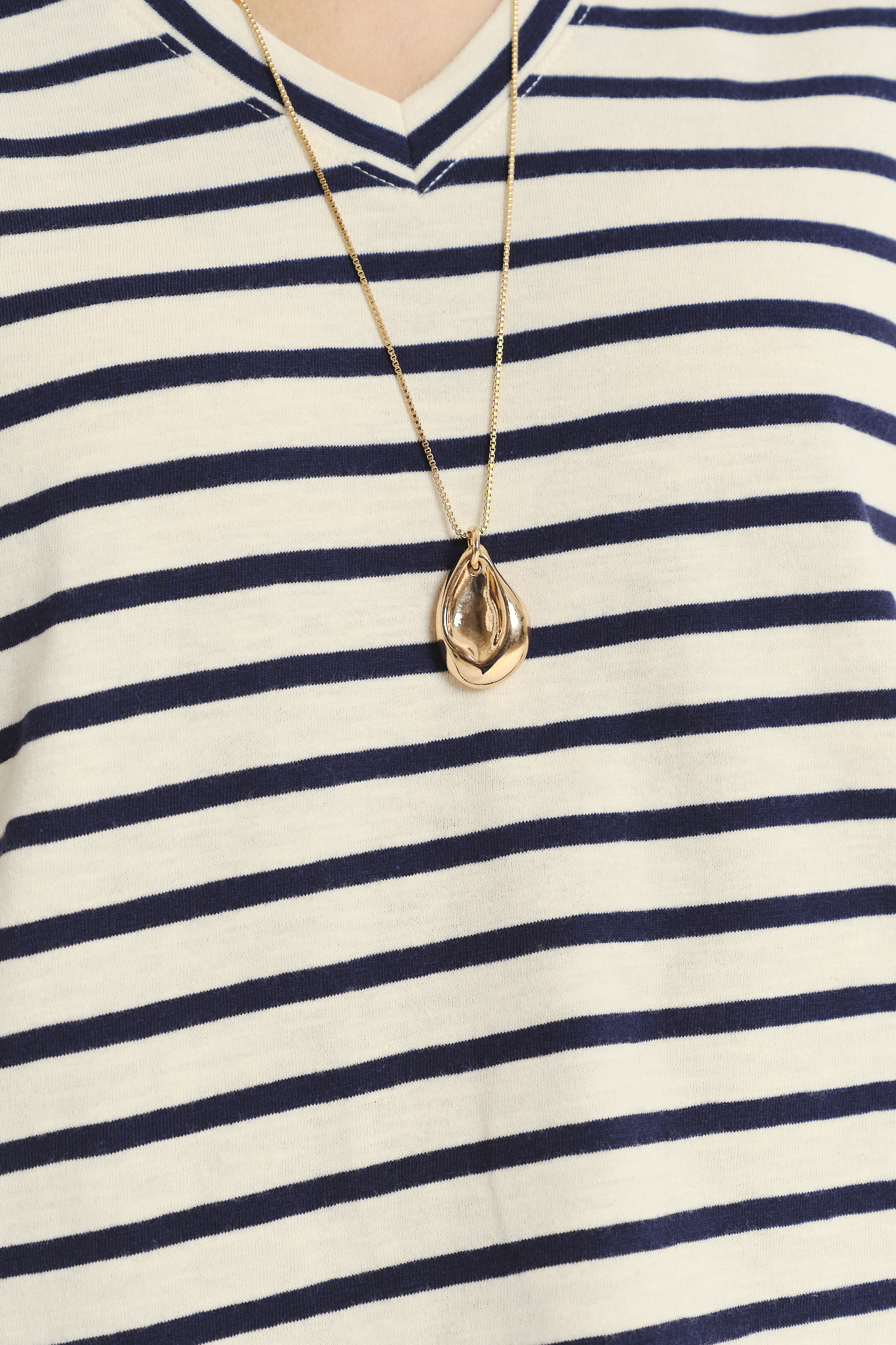 Luźny top w kontrastowe paski