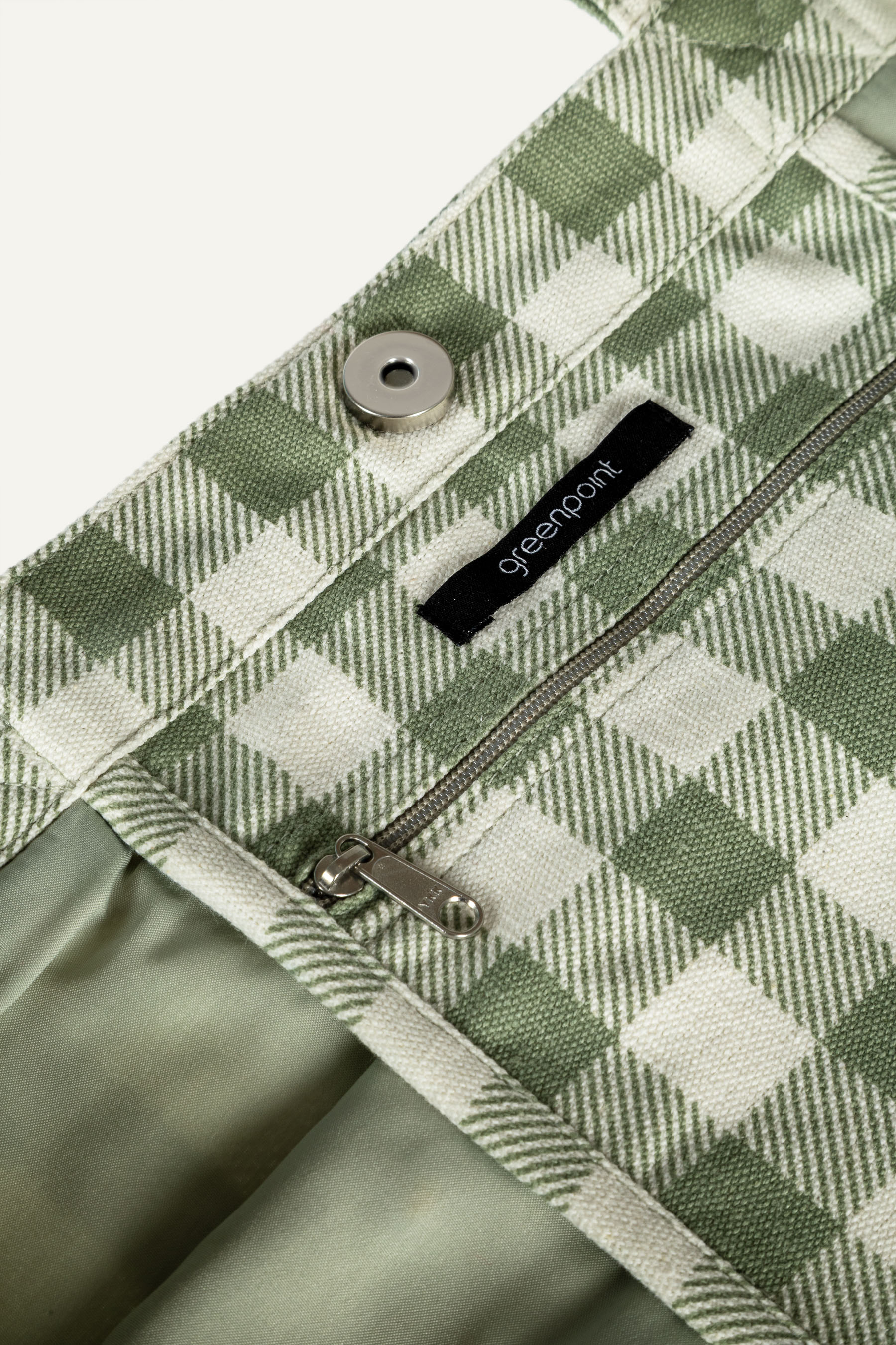 Kremowo-zielona torba z nadrukiem w stokrotki