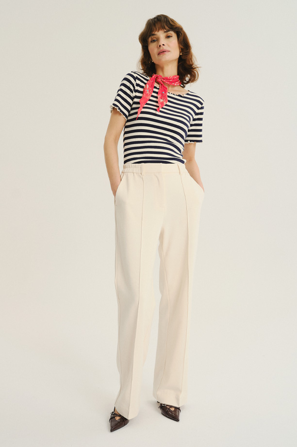 Kremowe spodnie z dodatkiem bawełny