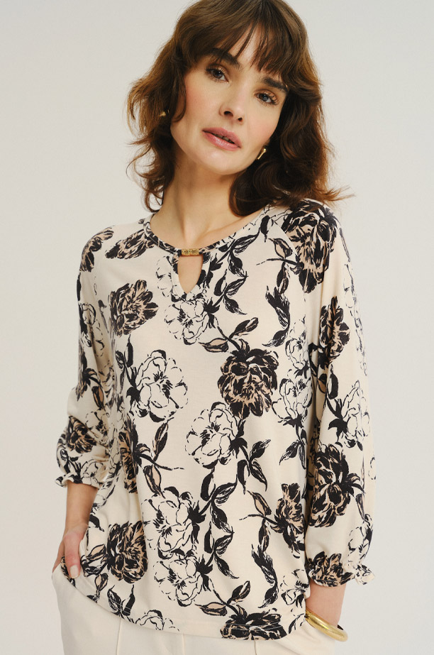 Kremowy top z nadrukiem w kwiaty