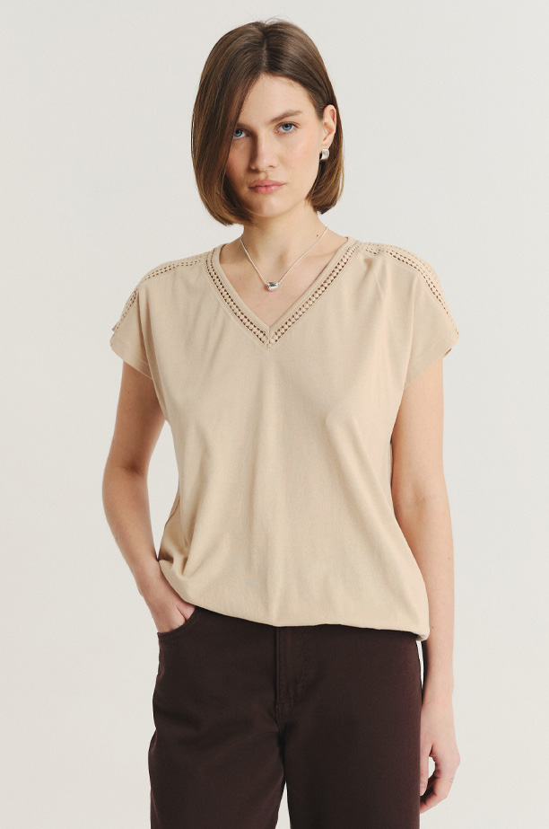 Uniwersalny beżowy top