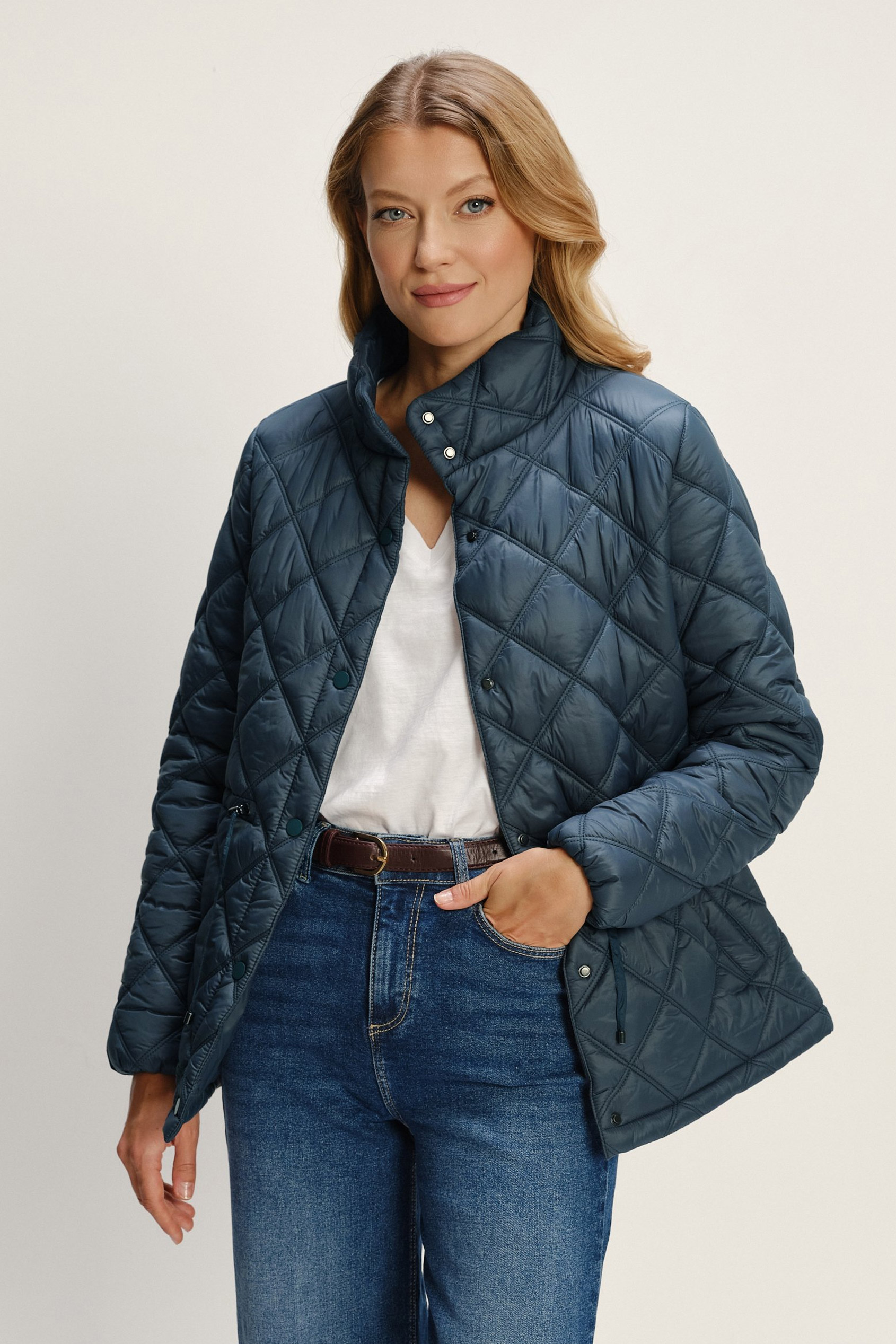 Turkusowa pikowana kurtka z wysokim kołnierzem