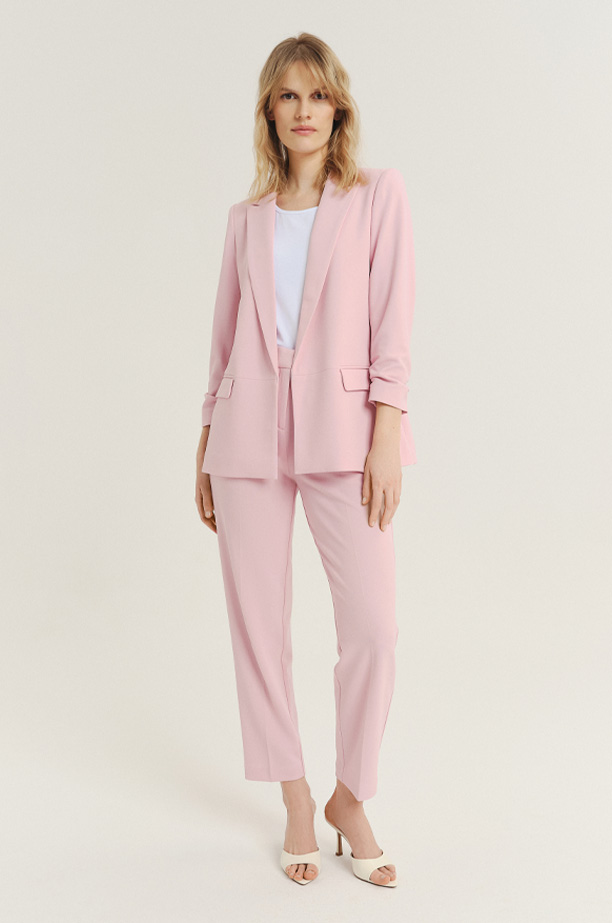 Eleganckie jasnoróżowe spodnie typu cygaretki