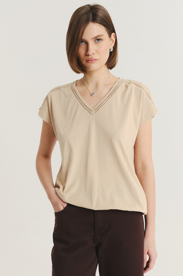 Uniwersalny beżowy top