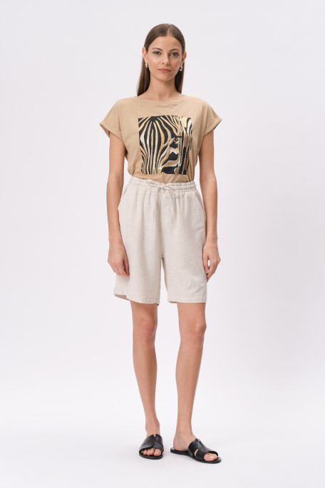 Jasnobeżowy top z grafiką animal