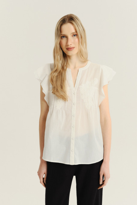 Kremowa bluzka z falbankami 