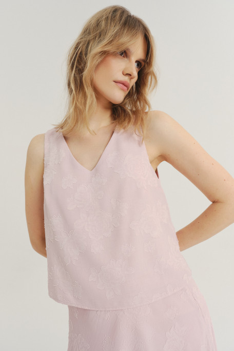 Jasnoróżowa bluzka w subtelna kwiaty 