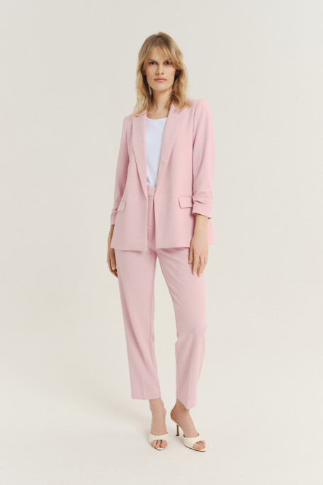 Eleganckie jasnoróżowe spodnie typu cygaretki