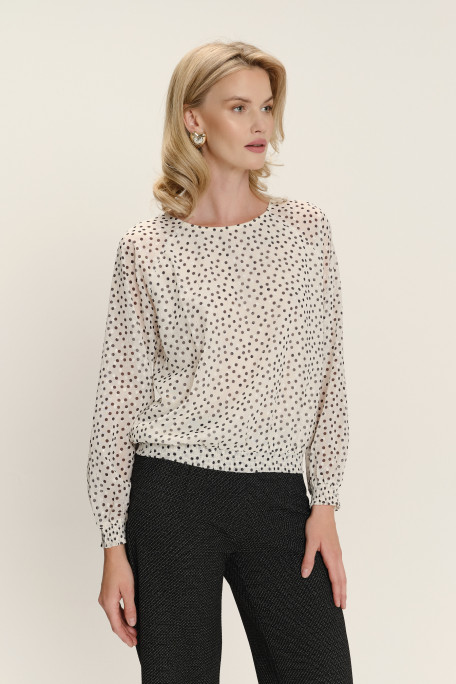 Biała bluzka z zapięciem typu łezka nadruk w kropki
