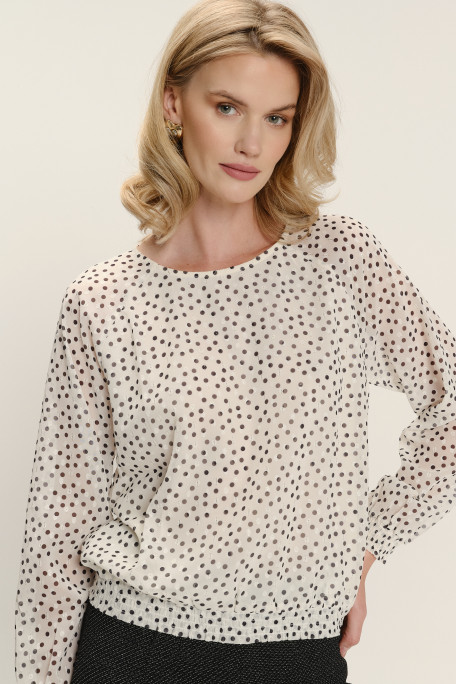 Biała bluzka z zapięciem typu łezka nadruk w kropki