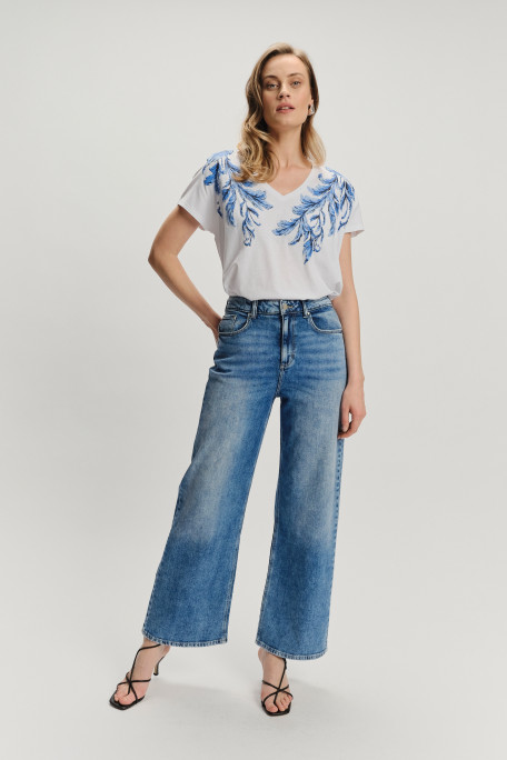Stylowe jeansy z przetarciami krój wide leg