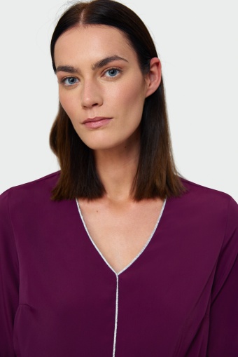 Fioletowa bluzka z błyszczącą lamówką