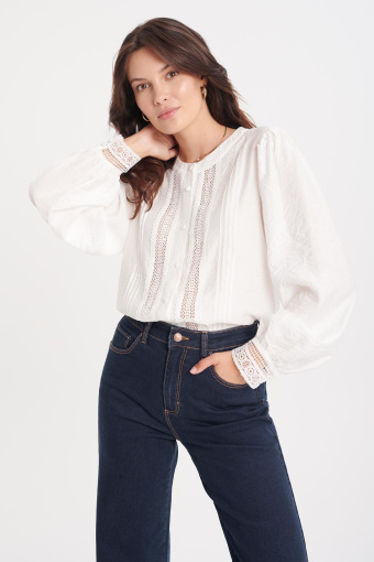 Kremowa bluzka z dekoracyjnym, długim rękawem