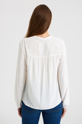 Romantyczna, biała bluzka z wiązaniem przy dekolcie