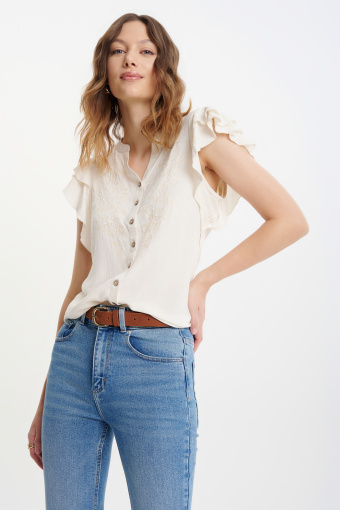 Kremowa bluzka z rękawami typu motylki