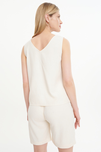 Kremowa bluzka na szerszych ramiączkach