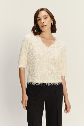 Kremowa bluza z efektownym wykończeniem