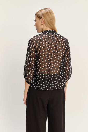 Efektowna czarna bluzka w kropki z rękawami do łokcia