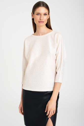 Kremowa bluza z błyskiem i wycięciem na plecach Kremowa bluza z błyskiem i wycięciem na plecach