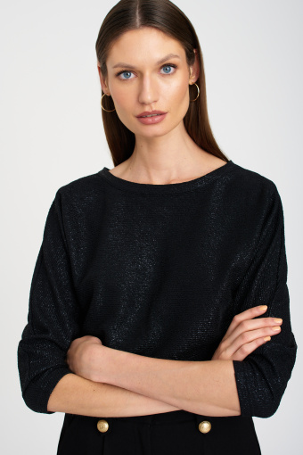Czarna, połyskująca bluza z odkrytymi plecami