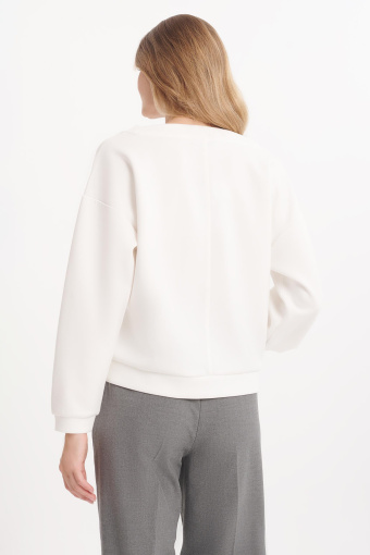 Kremowa bluza o bardzo luźnym fasonie