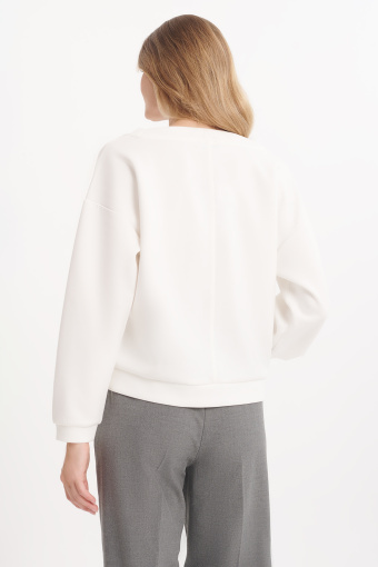 Kremowa bluza o bardzo luźnym fasonie