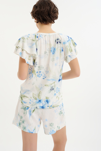 Bluzka w subtelne niebieskie kwiaty 