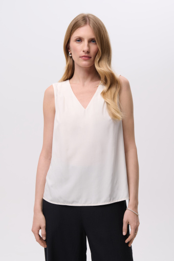 Elegancka bluzka w kolorze kremowym 