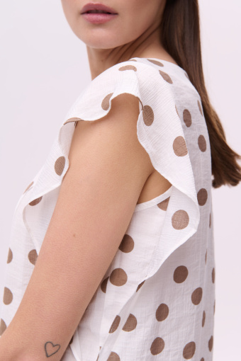 Bluzka w beżowe grochy 