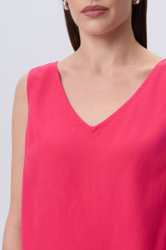 Bluzka w różowym kolorze z dekoltem w serek  Bluzka w różowym kolorze z dekoltem w serek