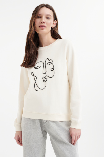 Kremowa bluza z minimalistycznym nadrukiem