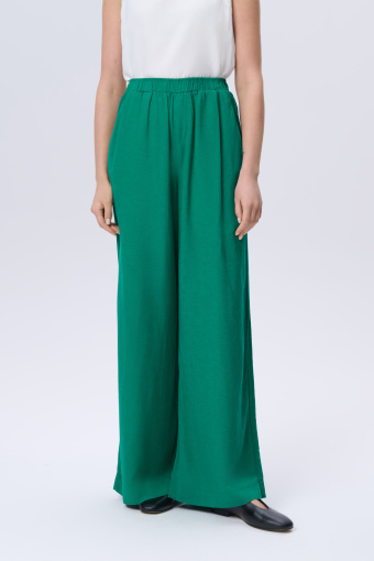 Spodnie z szeroką nogawką w zielonym kolorze