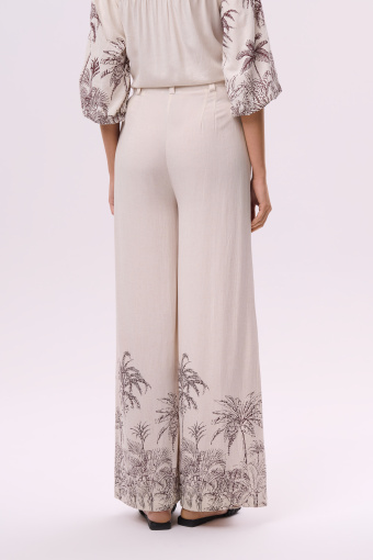 Luźne spodnie z nadrukiem w palmy