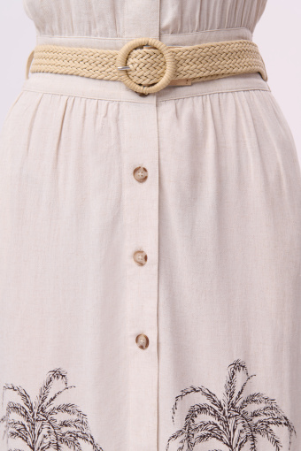 Jasnobeżowa sukienka z nadrukiem w palmy