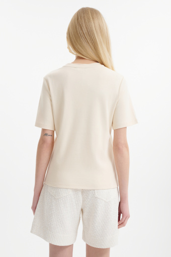 Kremowy top o prostym kroju 