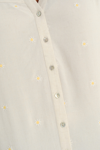 Subtelna kremowa bluzka z riuszką