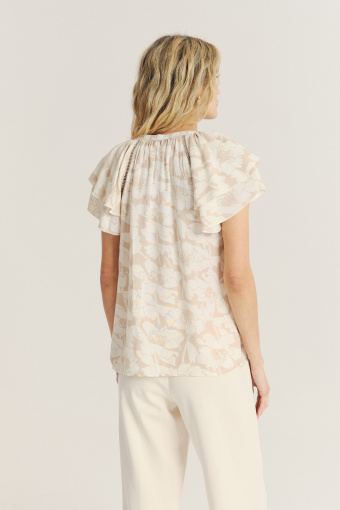 Kremowo-beżowa bluzka z subtelne kwiaty