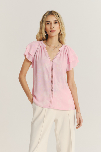 Jasnoróżowa bluzka z rękawami typu motylki