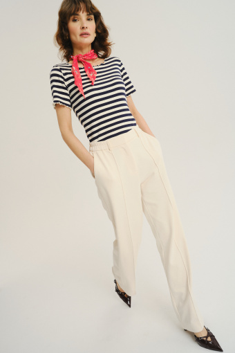 Kremowe spodnie z dodatkiem bawełny