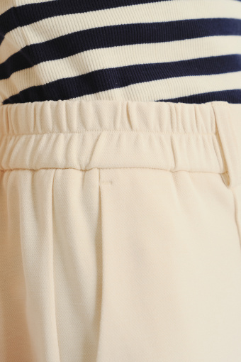 Kremowe spodnie z dodatkiem bawełny