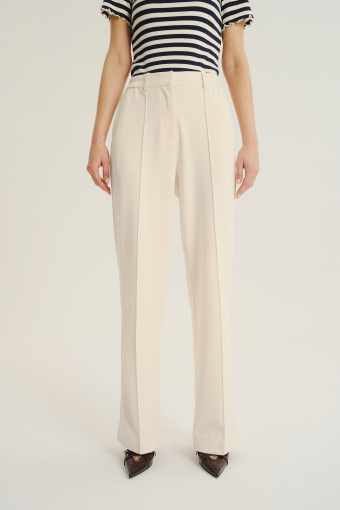 Kremowe spodnie z dodatkiem bawełny