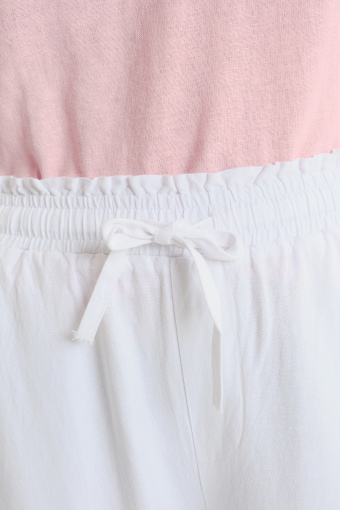 Lniano-wiskozowe spodnie z troczkami u dołu nogawek